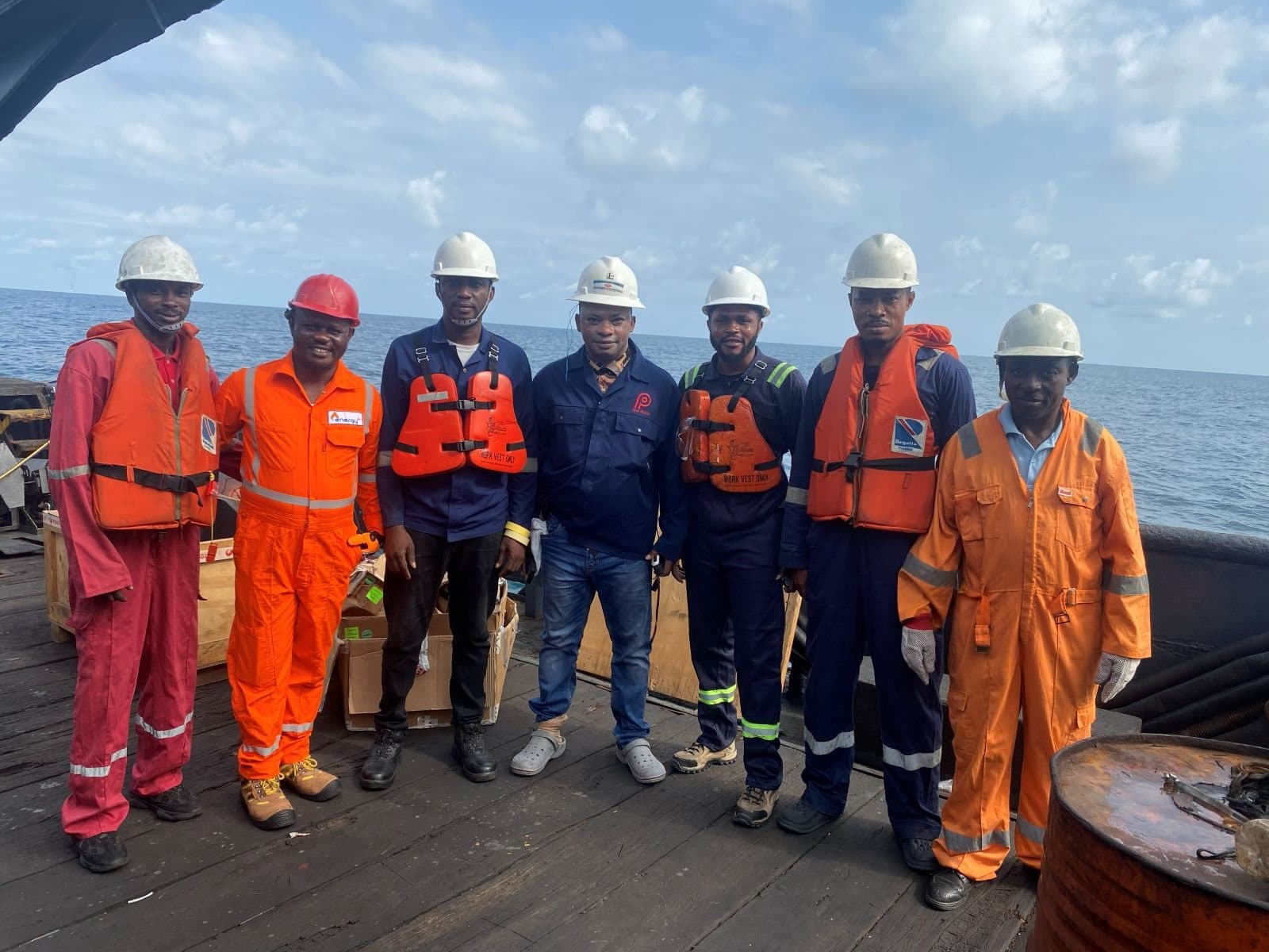 Joseph Legend Mfon with a survey team on location in the Niger Delta.